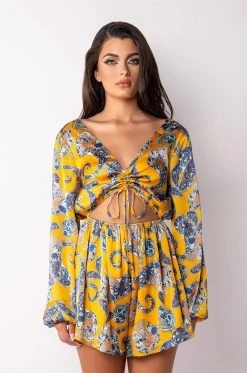 ADMIT IT LONG SLEEVE PRINTED ROMPER WITH CUT OUT -AKIRA Shop admit it long sleeve printed romper with cut out yellow multi 3 3