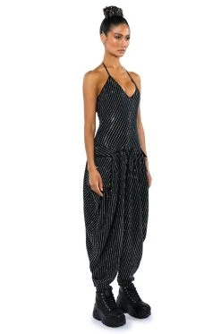 LONDON RHINESTONE STRIPE RELAXED FIT HALTER NECK JUMPSUIT 13 LONDON RHINESTONE STRIPE RELAXED FIT HALTER NECK JUMPSUIT -AKIRA Shop london rhinestone stripe relaxed fit halter neck jumpsuit black 4 4