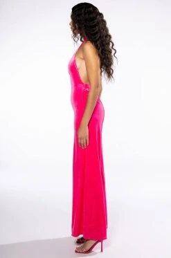 ON ME CROSS NECK VELVET FLARED JUMPSUIT -AKIRA Shop on me cross neck velvet flared jumpsuit fuchsia 3 3 c1